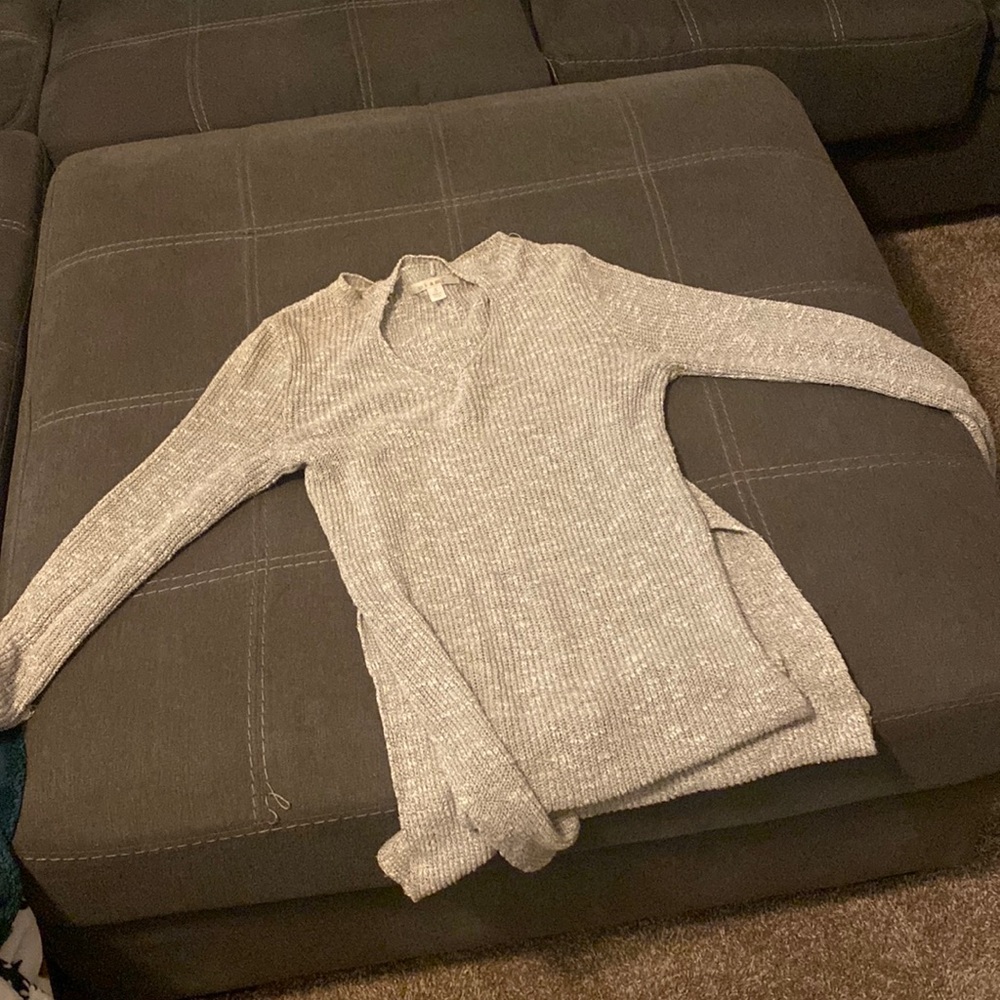Gray sweater wore it a lot but it’s in good condition